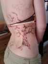 cherry blossom and sun tattoo